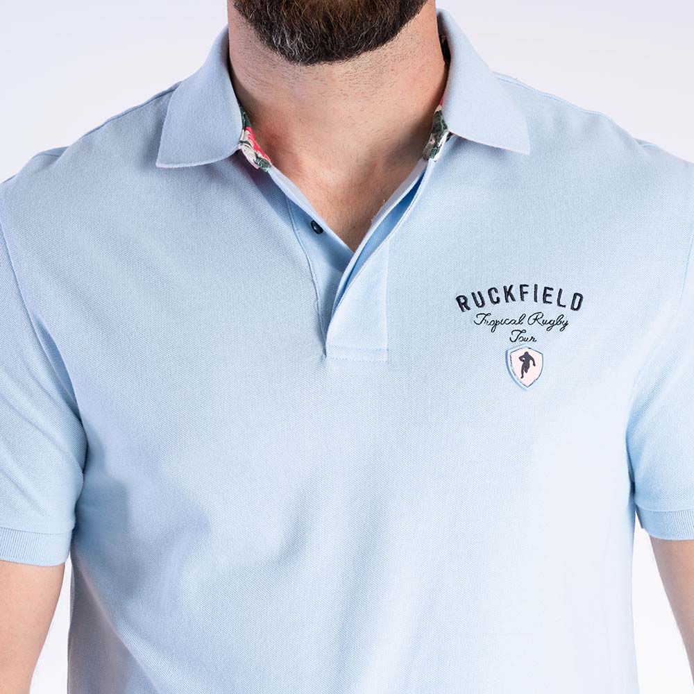 Tropisches Rugby Ruckfield Hellblaues Piqué-Polo